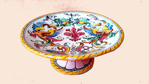 Alzata in ceramica Castelli dipinta a mano, decori a motivi vegetali e giglio centrale