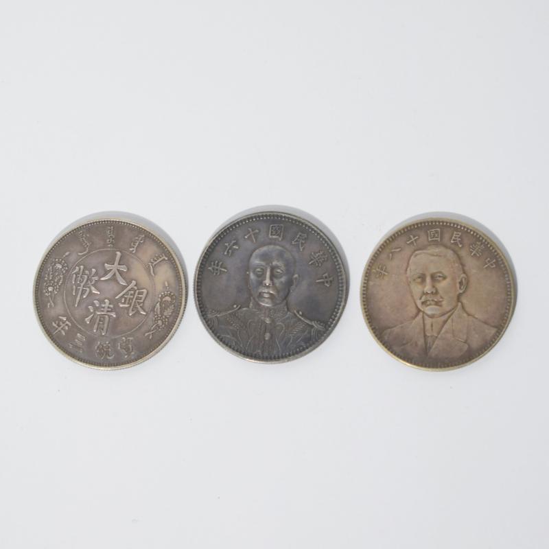 Tre monete cinesi