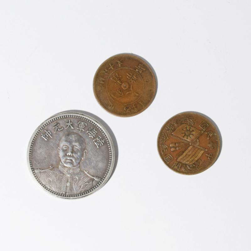 Tre monete cinesi